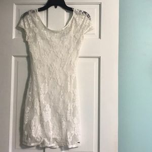 White lace dress with white slip under